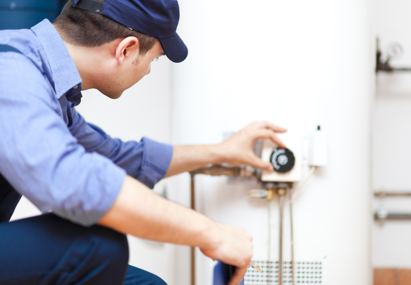 plumber adjusting water heater Hiram GA